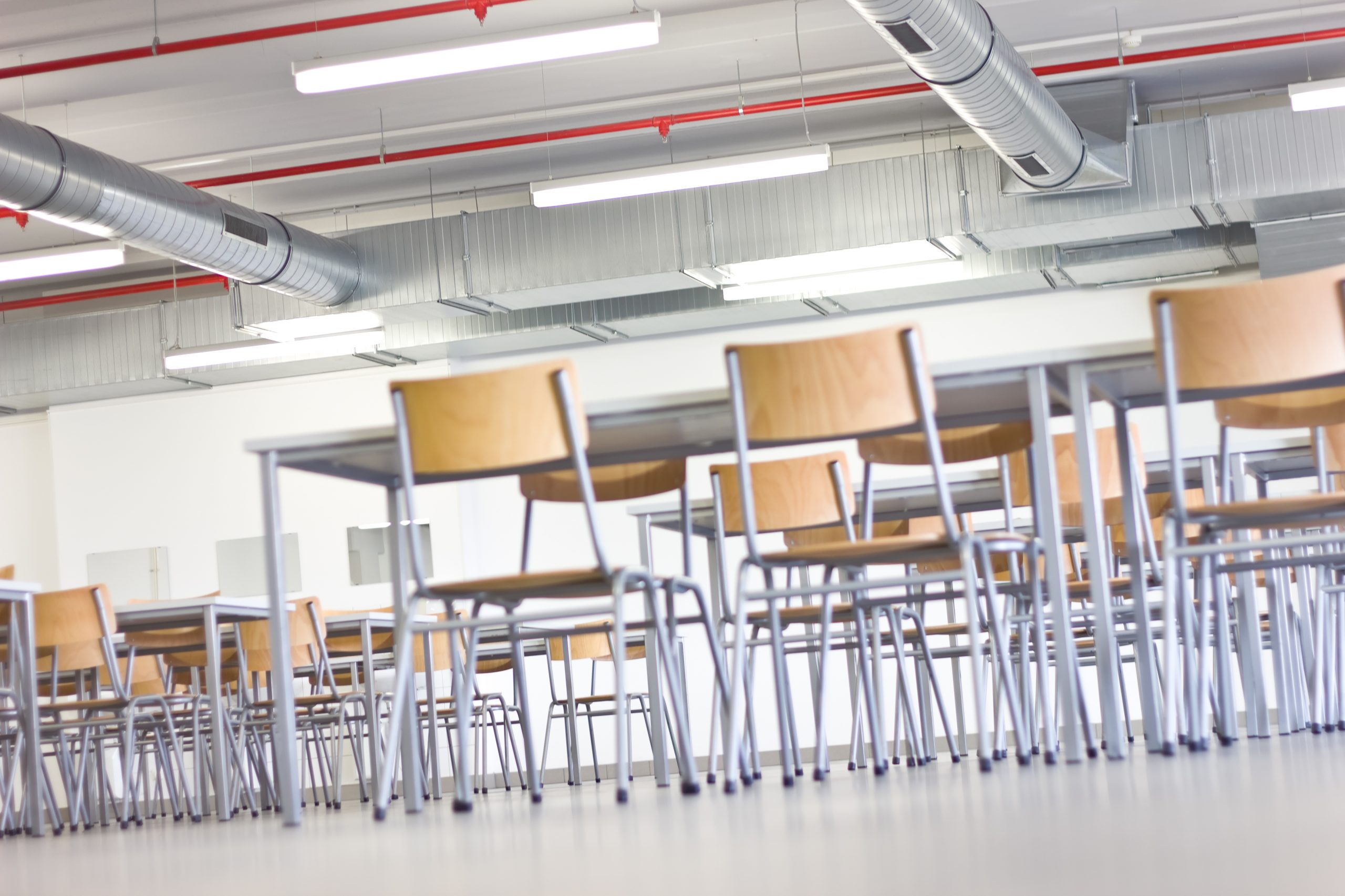 stock photo of a room with tables and chairs